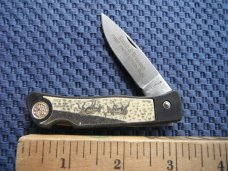 Smith & Wesson, S&W pocket knife marked "First Production Run" & "Performance"  Scrimshaw Deer scene