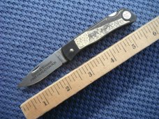 Smith & Wesson, S&W pocket knife marked "First Production Run" & "Performance"  Scrimshaw Deer scene