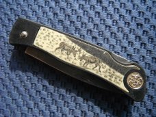 Smith & Wesson, S&W pocket knife marked "First Production Run" & "Performance"  Scrimshaw Deer scene