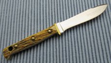 PUMA Buddy 11071 with sheath, box and paperwork. ..................(4) PUMA Buddy 11071 with sheath, box and paperwork. ..................(4)