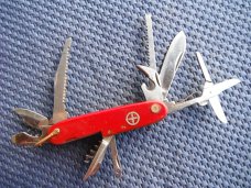 "Swiss Army" style multi tool pocket knife.  Made  in  Japan!!!