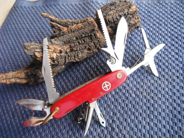 "Swiss Army" style multi tool pocket knife.  Made  in  Japan!!!
