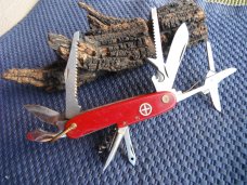 "Swiss Army" style multi tool pocket knife.  Made  in  Japan!!!