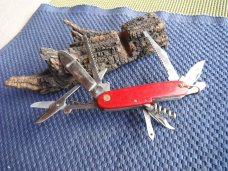 "Swiss Army" style multi tool pocket knife.  Made  in  Japan!!!