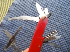 "Swiss Army" style multi tool pocket knife.  Made  in  Japan!!!