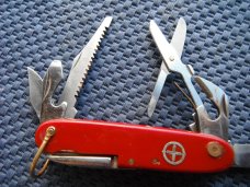 "Swiss Army" style multi tool pocket knife.  Made  in  Japan!!!