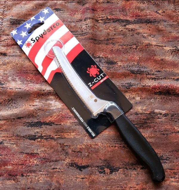 Spyderco Z-Cut kitchen knife. Black round tip serrated. Made in the USA. Brand new. K13SBK Spyderco Z-Cut kitchen knife. Black round tip serrated. Made in the USA. Brand new. K13SBK