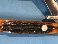 Queen Cutlery Cheetah / Swing guard knife w/ Beautiful Amber Bone Handles & Queen Shield -NOS & NM Queen Cutlery Cheetah / Swing guard knife w/ Beautiful Amber Bone Handles & Queen Shield -NOS & NM
