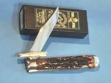Queen Cutlery Cheetah / Swing guard knife w/ Beautiful Amber Bone Handles & Queen Shield -NOS & NM Queen Cutlery Cheetah / Swing guard knife w/ Beautiful Amber Bone Handles & Queen Shield -NOS & NM