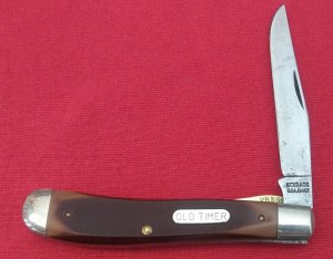A Schrade 194OT Gunstock Lock Blade Trapper