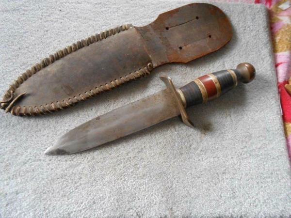 Very Nice Old Theater or Trench Knife with original sheath.