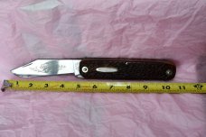 Western 932C Blade Lock-back and Saw Look at this Beast Bear etching.