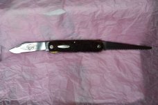 Western 932C Blade Lock-back and Saw Look at this Beast Bear etching.