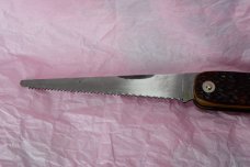 Western 932C Blade Lock-back and Saw Look at this Beast Bear etching.