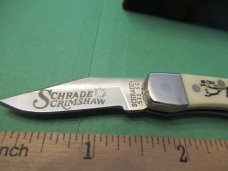 Schrade Scrimshaw Tiny Folding Hunter Model SC-511 Schrade Scrimshaw Tiny Folding Hunter Model SC-511