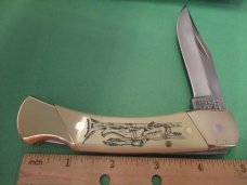 Schrade Scrimshaw Folding Hunter Sun Dance Schrade Scrimshaw Folding Hunter Sun Dance