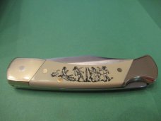 Schrade Scrimshaw Folding Hunter Sun Dance Schrade Scrimshaw Folding Hunter Sun Dance