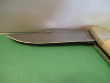 Schrade Folding Hunter Limited Edition Scrimshaw Bear Cult Schrade Folding Hunter Limited Edition Scrimshaw Bear Cult
