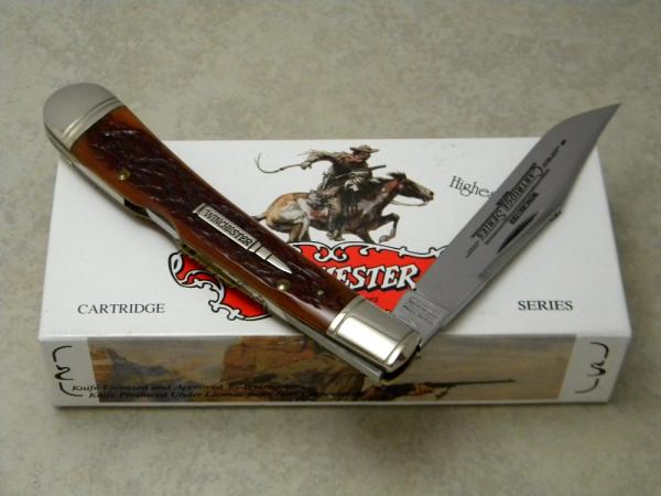 Winchester Trademark USA 1994 Burnt Orange Bone 19107 Cartridge Series Banana Lockback Knife in Box Winchester Trademark USA 1994 Burnt Orange Bone 19107 Cartridge Series Banana Lockback Knife in Box