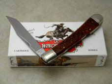 Winchester Trademark USA 1994 Burnt Orange Bone 19107 Cartridge Series Banana Lockback Knife in Box Winchester Trademark USA 1994 Burnt Orange Bone 19107 Cartridge Series Banana Lockback Knife in Box