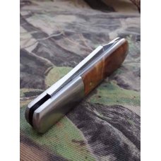 Kroo Custom handmade Barlow pattern knife with Clip Point Blade and Sneezewood Burl Scales. Kroo Custom handmade Barlow pattern knife with Clip Point Blade and Sneezewood Burl Scales.
