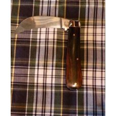 A Wright & Son, Sheffield, England Hawkbill Pruning Knife with Ebony Scales and Curved Pruning Blade A Wright & Son, Sheffield, England Hawkbill Pruning Knife with Ebony Scales and Curved Pruning Blade