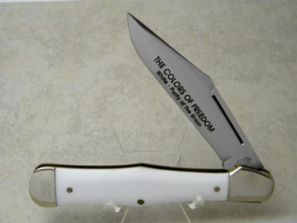 Queen USA #38 White "The Colors of Freedom" Coke Bottle Folding Hunter Knife c.1992 Queen USA #38 White "The Colors of Freedom" Coke Bottle Folding Hunter Knife c.1992