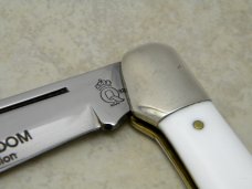 Queen USA #38 White "The Colors of Freedom" Coke Bottle Folding Hunter Knife c.1992 Queen USA #38 White "The Colors of Freedom" Coke Bottle Folding Hunter Knife c.1992
