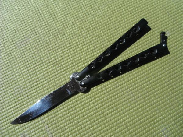 WYL Stainless USA Butterfly Knife /  Balisong knife  Blade marked "Stainless WYL USA." Blade 4" 