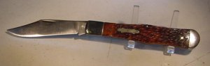 Colonial large folding hunter. jigged bone handles ,shield and made in the USA
