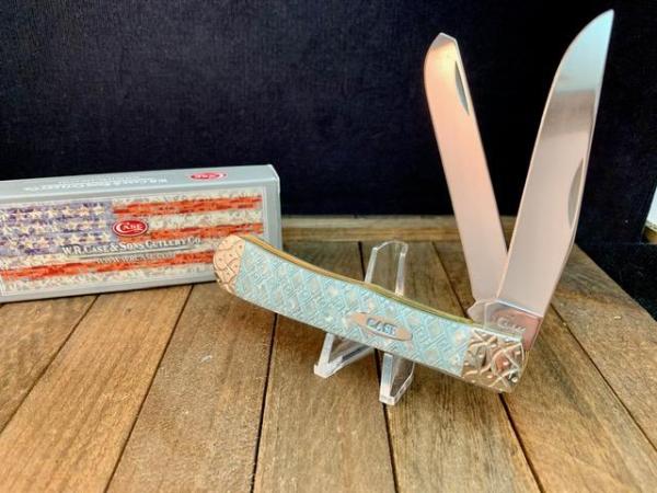 Case Trapper Skeletonized Imitation Pearl With Bolster Embellishments by Wild Horse Customs. Case Trapper Skeletonized Imitation Pearl With Bolster Embellishments by Wild Horse Customs.