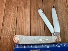 Case Trapper Skeletonized Imitation Pearl With Bolster Embellishments by Wild Horse Customs. Case Trapper Skeletonized Imitation Pearl With Bolster Embellishments by Wild Horse Customs.