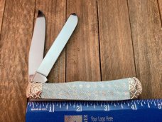 Case Trapper Skeletonized Imitation Pearl With Bolster Embellishments by Wild Horse Customs. Case Trapper Skeletonized Imitation Pearl With Bolster Embellishments by Wild Horse Customs.