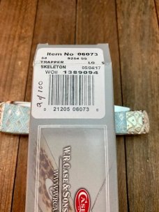 Case Trapper Skeletonized Imitation Pearl With Bolster Embellishments by Wild Horse Customs. Case Trapper Skeletonized Imitation Pearl With Bolster Embellishments by Wild Horse Customs.