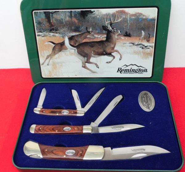 REMINGTON SPORTSMAN SERIES SET OF 3 WOOD HANDLE KNIVES IN A TIN DISPLAY AS NEW YEARS BACK REMINGTON SPORTSMAN SERIES SET OF 3 WOOD HANDLE KNIVES IN A TIN DISPLAY AS NEW YEARS BACK