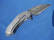 Discontinued Grindhouse Knives Custom DSK Flipper 3.5" 1095 Hamon Wharncliffe Blade, Titanium Handle Discontinued Grindhouse Knives Custom DSK Flipper 3.5" 1095 Hamon Wharncliffe Blade, Titanium Handle