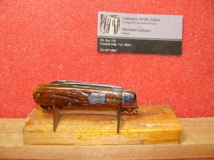 RUSSELL USA (CURVED) TURNERS FALLS,MA 1875-1941 3 3/8" JACK KNIFE BROWN BONE HANDLES