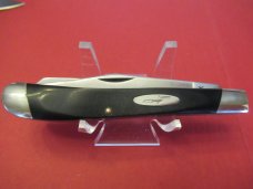 Buck Rough Black Saw Cut  Trapper 