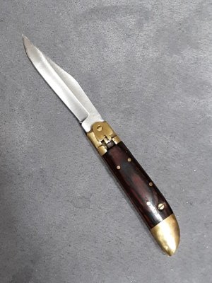 Lever lock knife. 