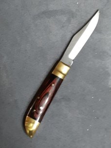 Lever lock knife. Lever lock knife.