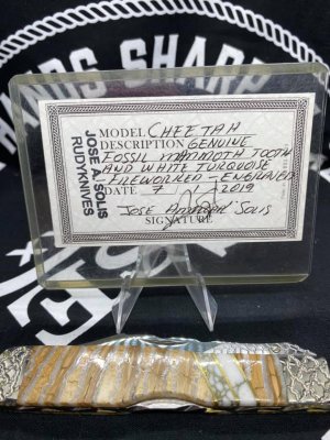beautiful Rudy Knives custom mammoth tooth cheetah