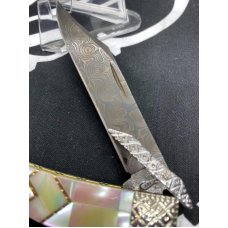 1 of only 3 made, wild horse custom cheetah w/ vintage fiery MOP handles & raindrop damascus blades 1 of only 3 made, wild horse custom cheetah w/ vintage fiery MOP handles & raindrop damascus blades
