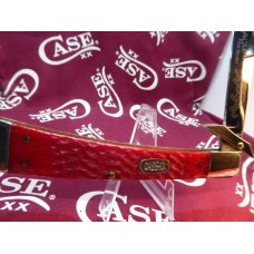 first model case jaguar, 3 dot, red jigged bone. near mint