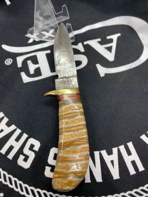 gorgeous custom fixed blade with mammoth handles and damascus blades
