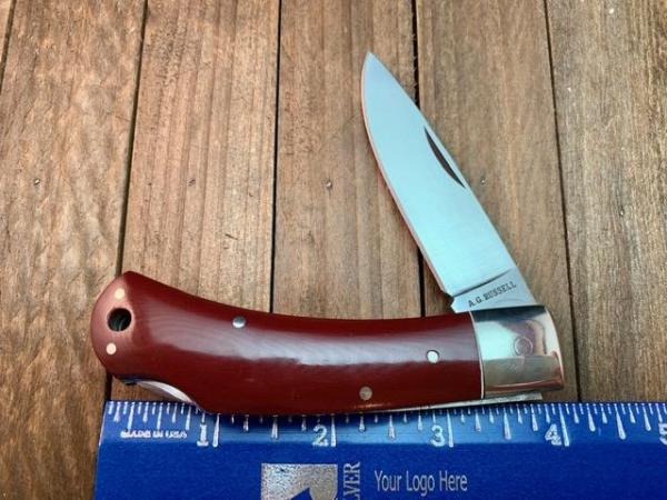 A.G. Russell 4” Lockback Made in Seki Japan Red Micarta Handles Factory 2nd A.G. Russell 4” Lockback Made in Seki Japan Red Micarta Handles Factory 2nd