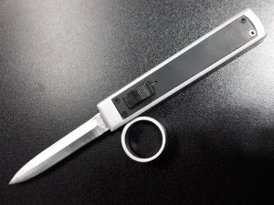 Tomb Raider OTF knife. 