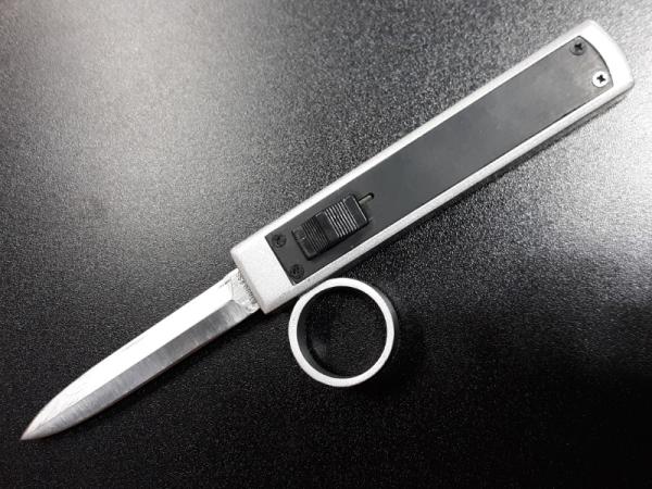 Tomb Raider OTF knife. 