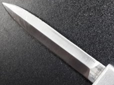 Tomb Raider OTF knife. 