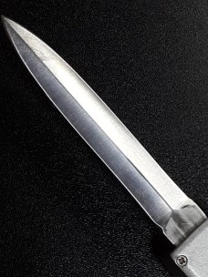 Tomb Raider OTF knife. 