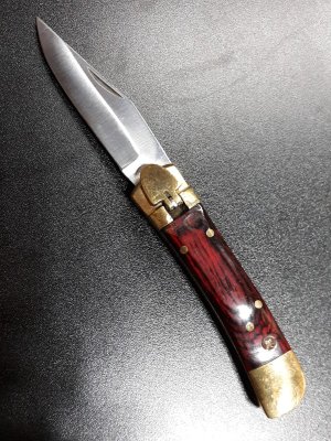 Lever lock knife. 